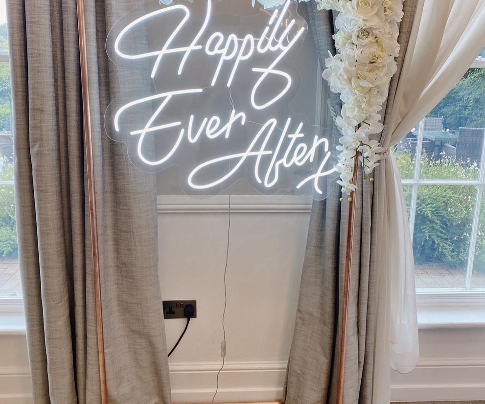 Happily ever after neon sign and copper frame with flowers Cheshire