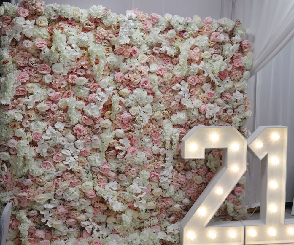 Pink and white flower wall backdrop hire in Manchester and Cheshire