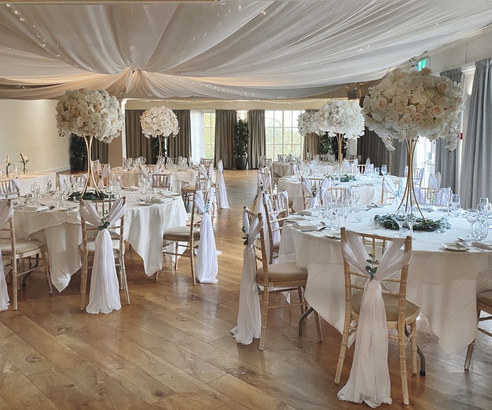 White rose centre pieces and wedding styling at Mere Court Knutsford