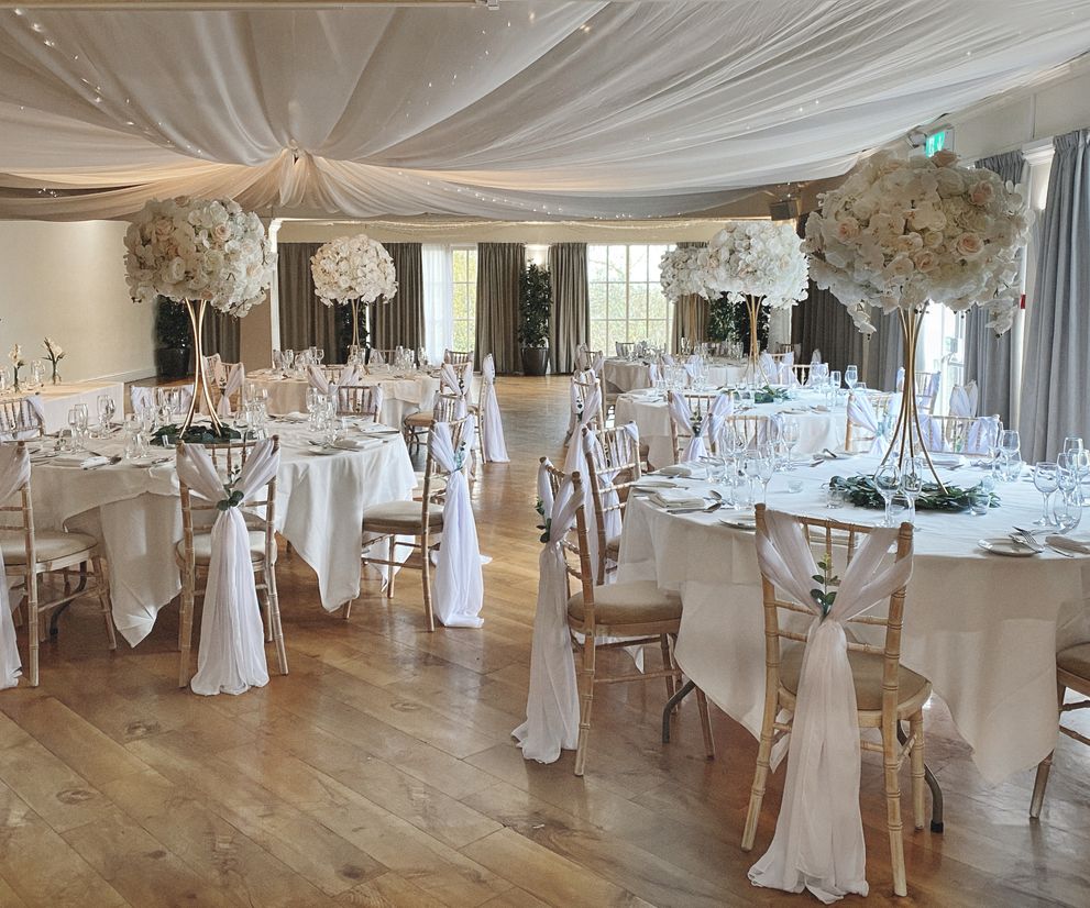 Wedding venue dressing centre pieces and chair styling Cheshire
