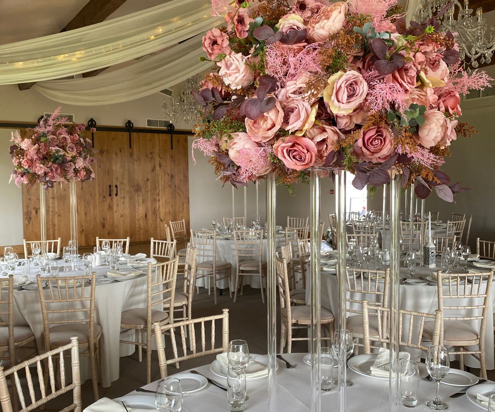 Tall duksy blush pink wedding centre pieces to hire in Cheshire
