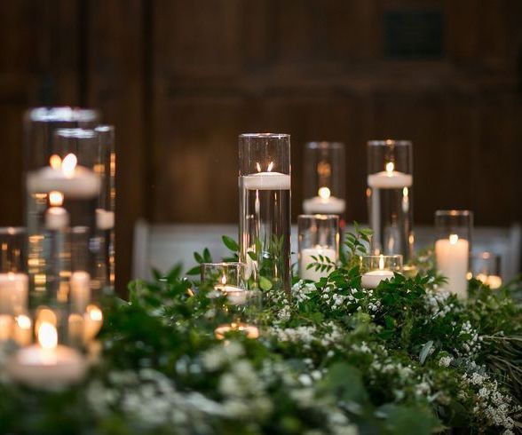 Wedding top table candle ideas with foliage venue stylists in Cheshire