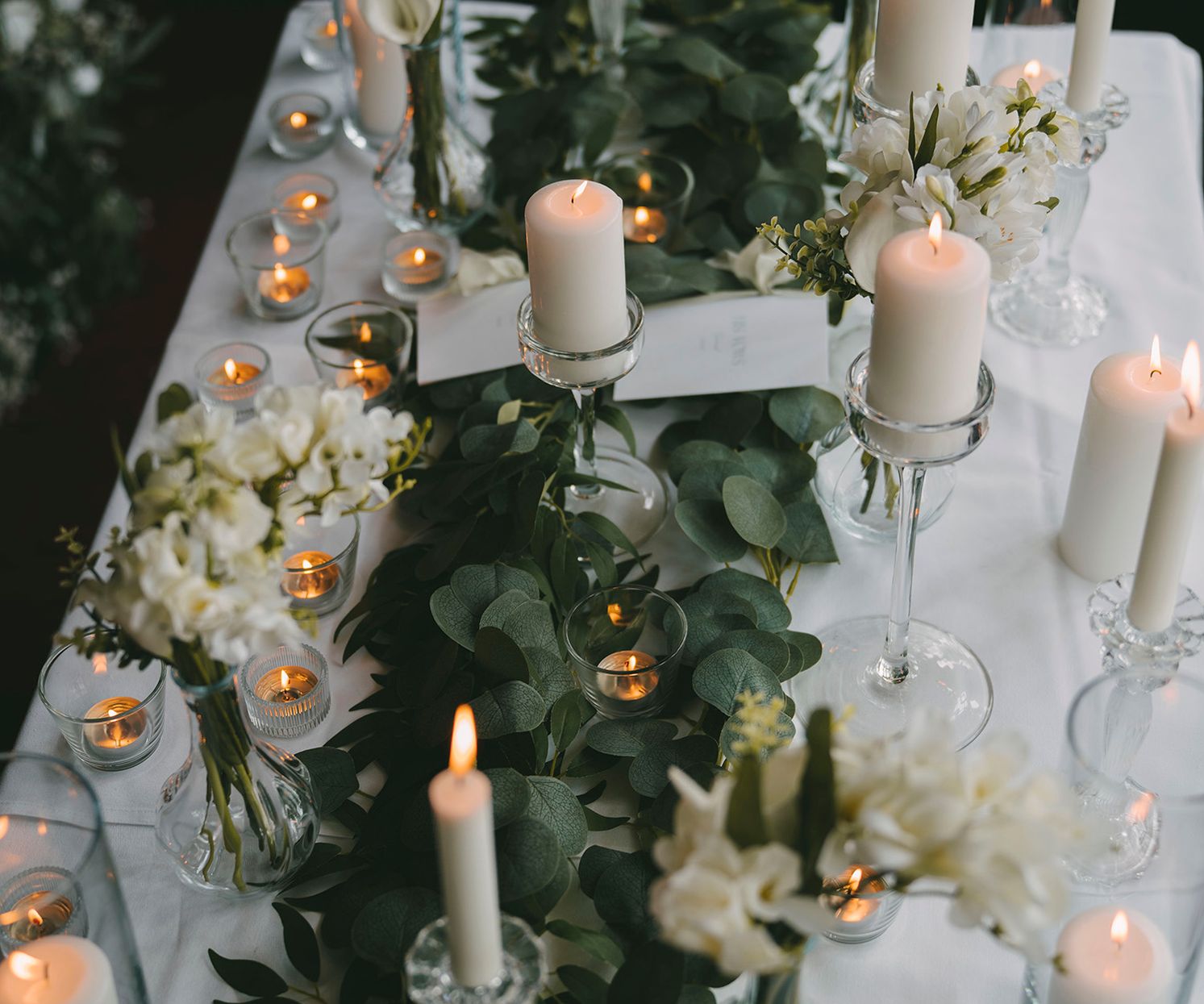 Wedding ceremony table foliage and candle ideas venue dresser Cheshire