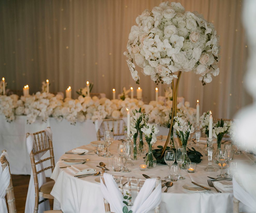 White rose tall centre pieces with orchids to hire in Cheshire