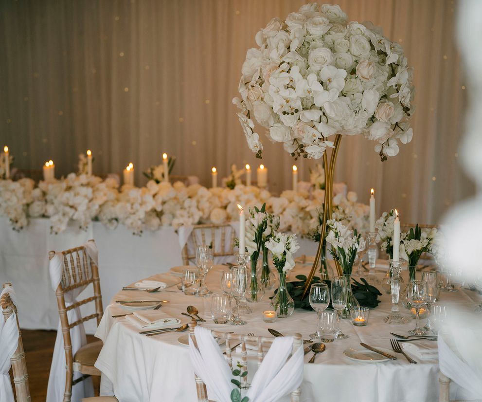 White elegant wedding centre pieces venue dressers in  Cheshire
