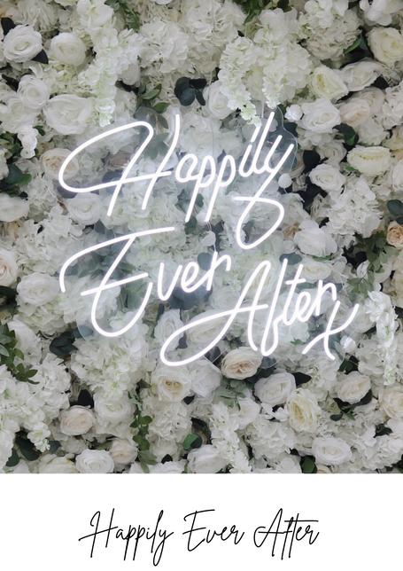 White wedding flower wall backdrop hire with happily ever after wedding neon sign hire in Cheshire